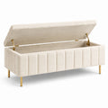 Banco de madera tapizado en bouclé beige con patas metálicas doradas